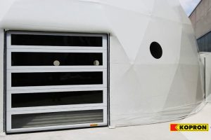 Porta sezionale Kopron per copertura in PVC